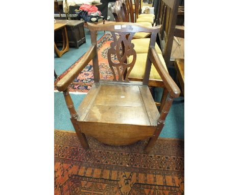 Early 19th century oak commode armchair with pierced vase splat back 