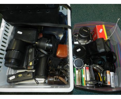 A large collection of SLR photographic equipment including Minolta 505si Super camera body with 28-80 AF kit lens, Minolta 70