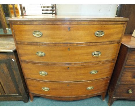 A George III mahogany bowfront chest of four long graduated drawers on shaped apron and splay bracket feet, 107cm wide, 55cm 