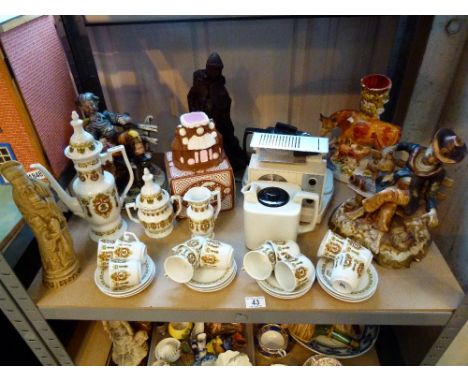 Shelf of mixed ceramics including Capodimonte figurines, Teas Maid, and a coffee set 