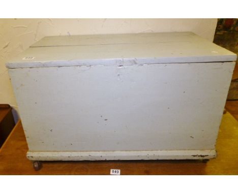 PINE BLANKET CHEST. Painted pine blanket chest with interior candle box on ceramic castors 47 x 55cm