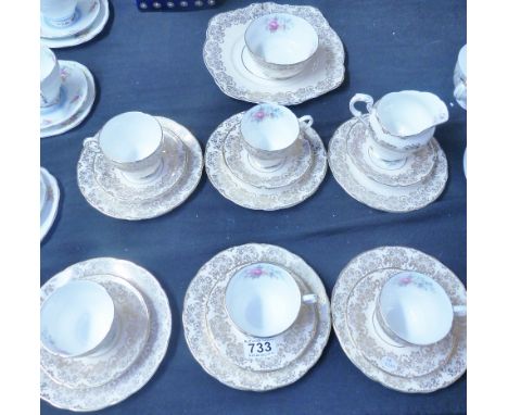 PARAGON PART TEA SERVICE. Paragon part tea service in floral and gilt design on ivory ground, twenty pieces