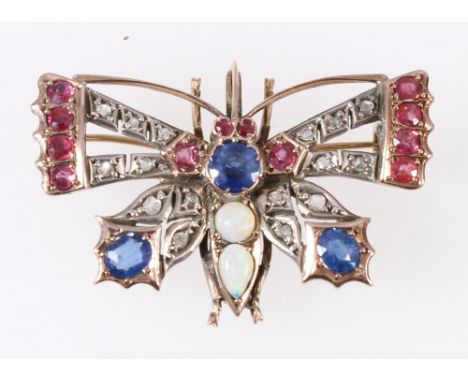 Diamond, ruby, sapphire and opal set butterfly brooch in yellow metal mounts, 9.5g, wing span 4cm.