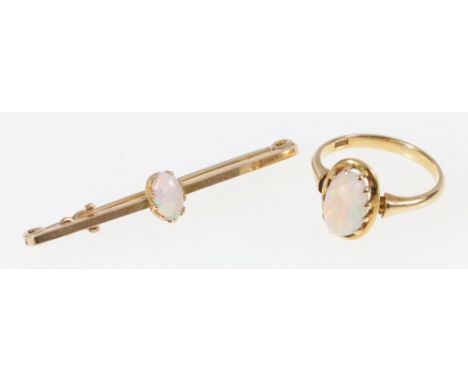 18ct yellow gold ring set with cabochon opal, size N, 3.5g and a gold bar brooch set with cabochon opal 2.2g (2)