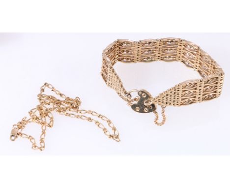 Yellow metal twist gate link bracelet with heart-shaped padlock clasp, the clasp stamped '375', gross 50.4g and a 9ct yellow 