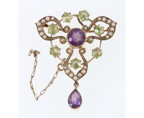 9ct yellow gold openwork brooch pendant set with amethyst, peridot and seed pearls. 3.6g, 3.5cm and 3cm wide CONDITION REPORT
