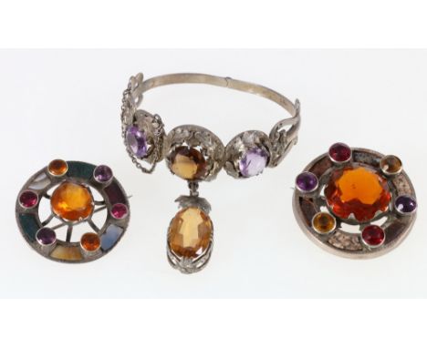 Two Scottish pebble and stone set targ brooches and an amethyst and citrine set bangle (3)