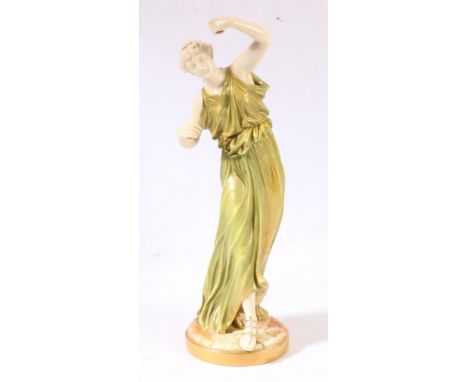 Royal Worcester shot enamel figure of a female dancer modelled by Hadley, dots date to 1897, registration number 260957, 33cm