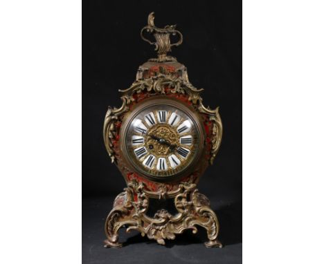 Louis Boname French Ormulu and boulle mantle clock, with urn finial, the dial with twelve Roman numeral chapter vignettes, th