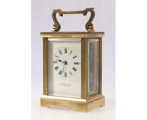Gilded brass cased carriage clock the dial with Roman numeral chapter ring marked for Garrard & Co Ltd of London 15cm