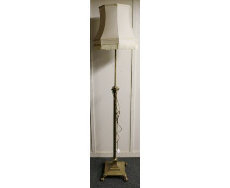 Brass Corinthian column standard lamp with adjustable height raised on stepped square base with paw feet, with shade, 215cm a