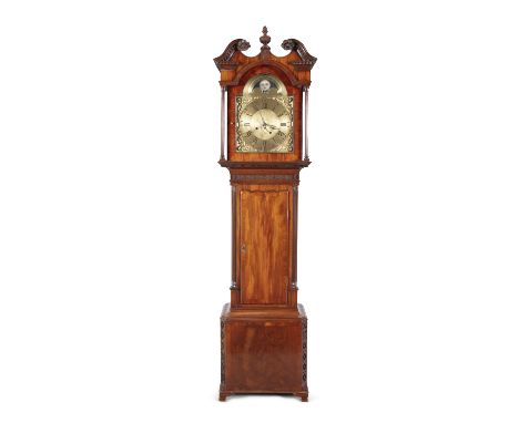 A LATE GEORGE III MAHOGANY LONGCASE CLOCK, the hood with broken swan neck pediment and central urn above an arch top door enc