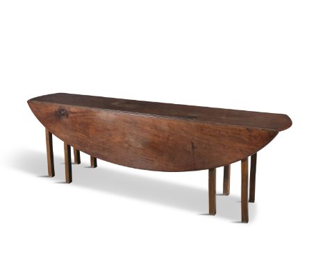 AN IRISH MAHOGANY DOUBLE DROP LEAF OVAL HUNT TABLE, on chamfered square gate leg supports. 212cm long, 125cm wide (open)