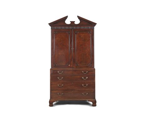 A GEORGE III MAHOGANY SECRETAIRE CABINET, the architectural top with broken triangular pediment and key pattern dentil mouldi