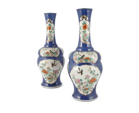 A PAIR OF CHINESE PORCELAIN POWDER BLUE GOURD VASES, Qing Dynasty, each with tall flared neck and bulbous body, decorated wit