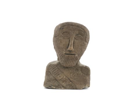 AN ANCIENT CELTIC STONE HEAD, probably 8th - 12th century, the flattened oval face carved with recessed features, the body wi