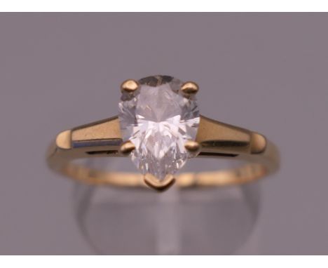 A 14 K gold solitaire ring. Ring size T. 4 grammes total weight.