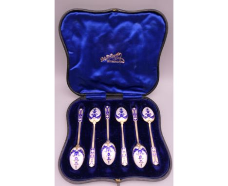 A set of six silver gilt blue and white enamel tea spoons, Birmingham 1959. 