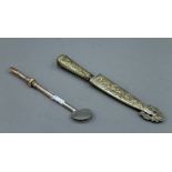 A 19th century Mate drinking straw (tests silver) with applied gold decoration and a white metal
