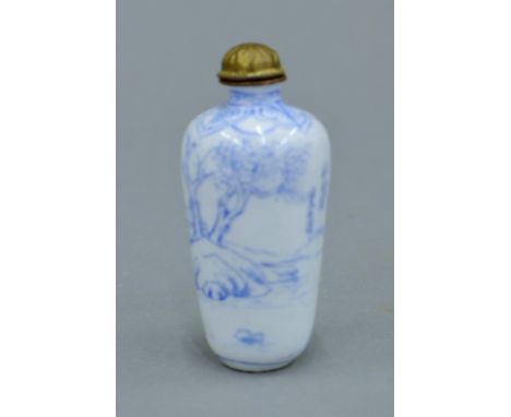 A Chinese blue and white enamel snuff bottle, signed. 6.5 cm high.