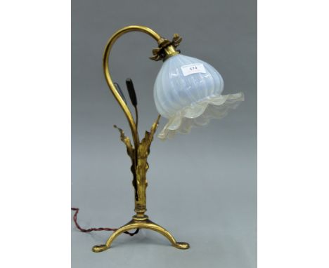 A Victorian brass bulrush design desk lamp, with moulded vaseline glass shade, in the manner of W A S Benson. 41 cm high.