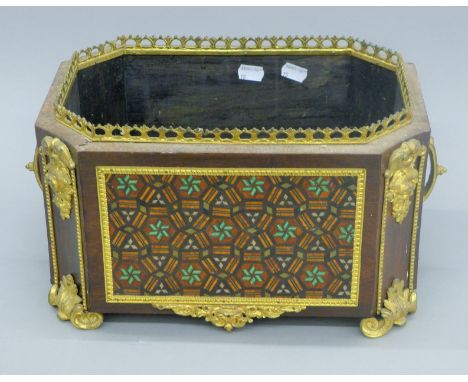 A 19th century Continental parquetry inlaid planter. 38 cm wide.