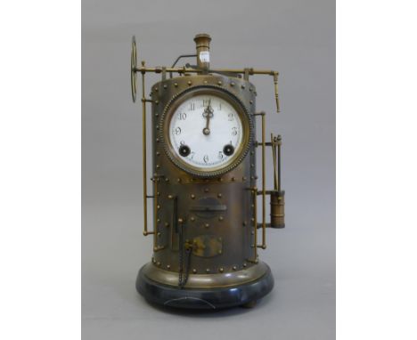 A bronze industrial clock. 41.5 cm high.