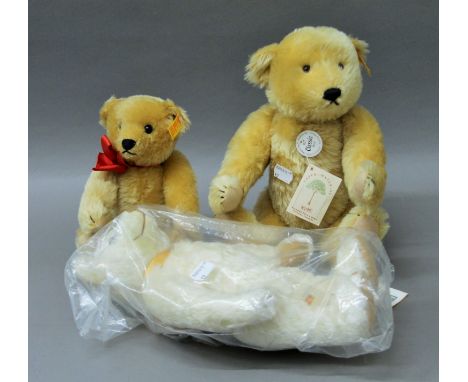 Three unboxed Steiff teddy bears.