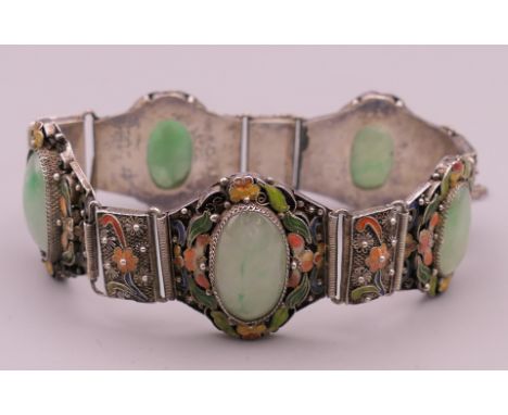 A vintage Chinese jade and enamelled silver bracelet. Approximately 18 cm long.