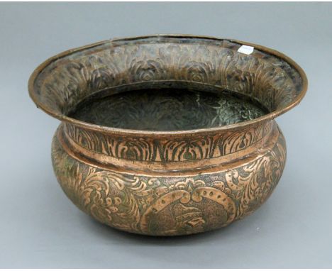 An antique copper basin decorated with the Coat of Arms of Venice, Lion of St Mark and a Doges. 21 cm high and 40 cm diameter