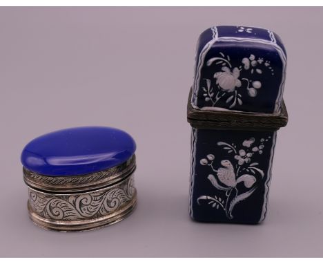 An 18th century blue and white enamel needle case and a small silver and blue stone oval box. The former 5.25 cm high.