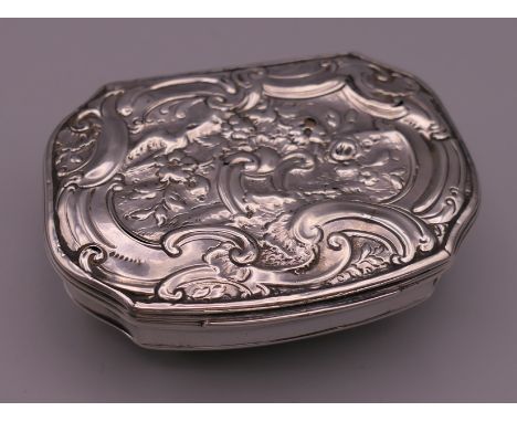 A George III Rococo style silver snuff box, hallmarks for London 1758. 7 cm wide. 60.9 grammes.