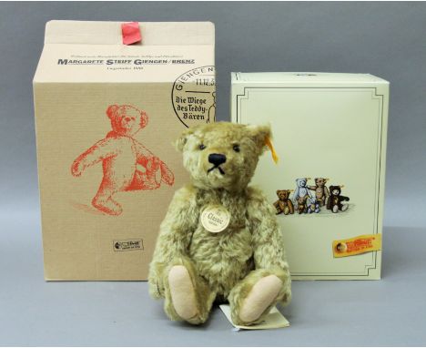 A Steiff boxed yellow tag classic teddy bear.