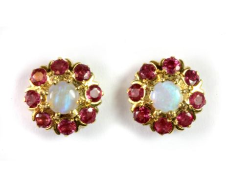 A pair of 9ct yellow gold opal and ruby cluster earrings.