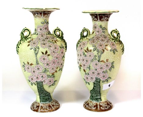 A pair of 19th century Hungarian ceramic vases, H. 25cm.