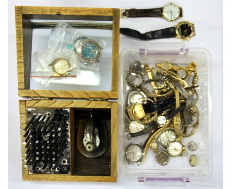 A quantity of watches and watch makers tools.