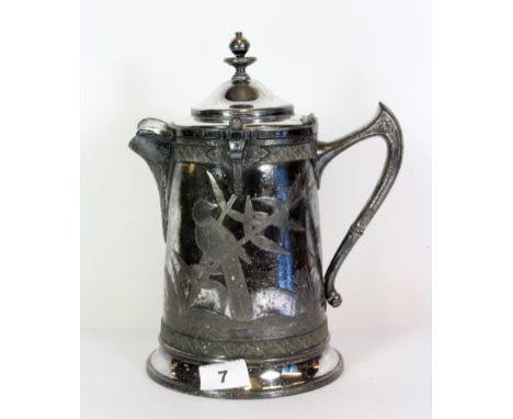 An interesting 19th century ceramic lined silver plated jug, H. 27cm.