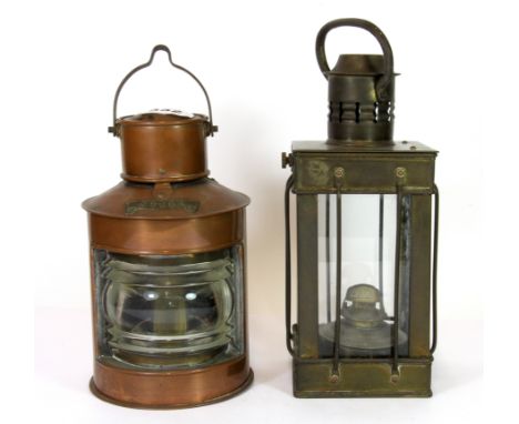 A copper and brass ships stern light (H. 26cm), together with a further brass paraffin lamp.