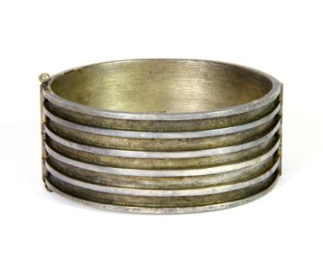 A heavy Finnish Aarikka silver limited edition bangle 11/100, designed by Kaija Aarikka, c. 1960's.