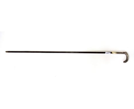 An Edwardian white metal mother of pearl and partridge cane walking stick.