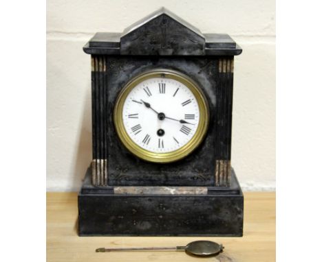 A 19th century French slate mantle clock, H. 28cm.