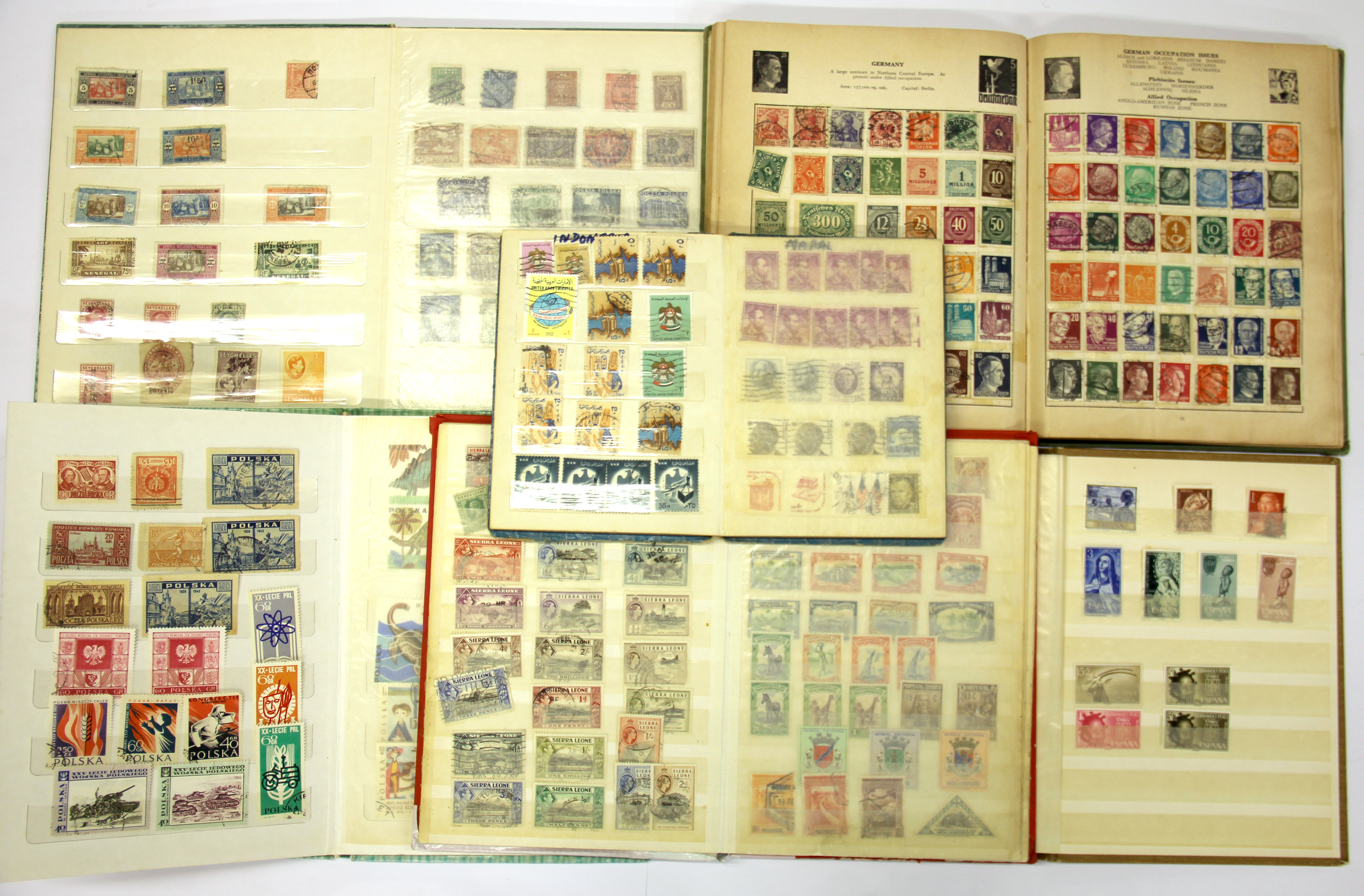 Six old stamp albums.