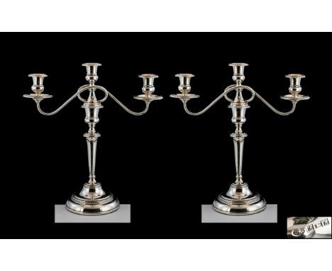 Elizabeth II Impressive Pair of Fine Quality Sterling Silver Two Branch Candelabra, Supported on a Circular Stepped Base. The