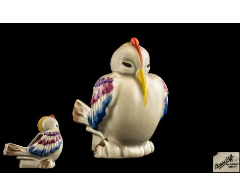 A Clarice Cliff Wilkinson Pottery Pipe Holder in the shape of a bird.  In good condition.