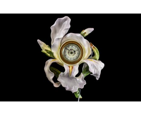 French Antique Porcelain Wall Bracket Clock In the Form of an Orchid With Its Leaves Open Decorated In Vibrant Colours, With 