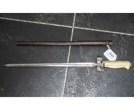 A French Model 1886/93/16 Bayonet, with brass hilt and scabbard.