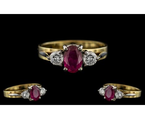 18ct Gold and Palladium - Superb and Attractive Ruby and Diamond 3 Stone Ring. Marked 750 and Pall. The Central Natural Ruby 