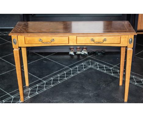 A Yew Wood Console Table with tapering legs and two drawers to the front.  Measures 42'' wide x 39'' depth x 28'' height.