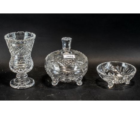 A Waterford Irish Crystal Lidded Trinket Pot and small dish. Both with original labels. Together with a small flower vase als