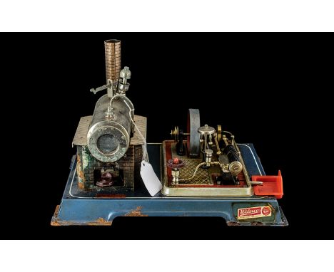 Wilesco Dampfmaschinen Model Steam D16 Beam Engine on metal platform base, with burner and water tank, stamped 'Made in West 
